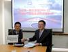 Liu Xiaofeng, Head of Dept. Noise & Vibration, Mechanical & System, DNV GL Maritime Advisory Services Greater China, Jacky Chow, Chief Operating Officer Shanghai Bluesoul, sign the advisory service contract. Photo DNV GL