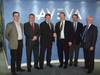 Magne Bakke, Chief Operating Officer, STX OSV AS and Richard Longdon, CEO, AVEVA with colleagues.