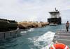 Military Sealift Command Maritime Prepositioning Ship USNS 1st Lt. Baldomero Lopez conducts an at-sea offload of Marine Corps cargo off the coast of Thailand May 2. The operation, which began April 28 and ended May 8, delivered cargo for the 3rd Marine Expeditionary Force, which will participate in Cobra Gold – an annual exercise designed to promote regional stability and security throughout Southeast Asia. A second MSC Maritime Prepositioning ship, USNS 1st Lt. Harry L. Martin, also participat