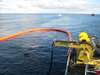 NorLense booms contain the spill and recovering onto a vessel with the Framo TransRec Oil Skimmer System  (Photo: Framo)