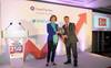 Peel Ports chief executive Mark Whitworth receiving the Sunday Times Grant Thornton Top Track 250 award from Grant Thornton UK chief executive Sacha Romanovitch