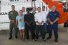 People rescued April 15 by the Coast Guard reunite with their rescuers at Air Station Clearwater, Fla., Thursday, April 27, 2017. (U.S. Coast Guard photo by Ashley J. Johnson)