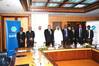 Principals at signing ceremony: Image UASC