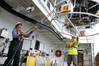 Professional mariners deploy equipment used to measure the seawater’s salinity, temperature and depth from NOAA Ship Reuben Lasker. (NOAA Marine and Aviation Operations/Maideline Sanchez)