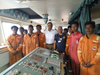 Rescued fishermen and ISL Star crew (Photo: Wallem)