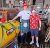 RRS James Cook Captain John Leask (right) and electro technical officer Harvey Jack (left) with the NOC’s Autosub Long Range (ALR) underwater robot (aka Boaty McBoatface), complete with some festive tinsel. Image courtesy NOC