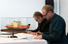 Signing of the meeting minutes at the project kickoff meeting at Tandanor Shipyard in Buenos Aires, Argentina. From left: Miguel Tudino, President, Tandanor Shipyard and Lars Snellman, Project Manager, Aker Arctic. (Photo: Aker Arctic)