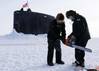 The Arctic region has become an area of intense geopolitical interest and competition. Field technicians assigned to the Arctic Submarine Laboratory prepare to remove ice from the Los Angeles-class attack submarine USS Hampton (SSN 767) at Ice Camp Whale on the Arctic Ocean, during Operation Ice Camp (ICE CAMP) 2024. ICE CAMP is a three-week operation that allows the Navy to assess its operational readiness in the Arctic, increase experience in the region, advance understanding of the Arctic env