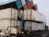 The collapsed row of containers on the barge Ho’omaka Hou in Hilo, Hawaii. (Photo: U.S. Coast Guard.)