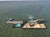 The dredge barge Everett Fisher sits aground in the Matagorda Ship Channel near Port Lavaca, Texas. (U.S. Coast Guard photo by Sector/Air Station Corpus Christi)