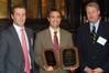 The Shipbuilders Council of America present the Award for Excellence in Safety and the Award for Improvement in Safety for 2009 to Bollinger executive vice president, Chris Bollinger during the April 2010 meeting held in Washington, D.C.  (Pictured left to right: Ian Bennitt, SCA - Manager Government Affairs; Chris Bollinger, Bollinger Shipyards - Executive Vice President; and Matthew Paxton, SCA - President.) Photo courtesy Bollinger Shipyards