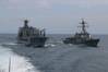 The USS Mustin conducts undrway replenishment operations somewhere in the South China Sea. (CREDIT: U.S. Navy)
