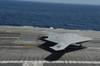 Unmanned X-47B on flight deck: Photo credit USN