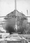 USS Intrepid Bow view, taken in dry dock, circa the 1870s. Note the torpedo projection device at her forefoot, pattern of her hull plating and the anchor hanging from her port hause pipe (U.S. Naval Historical Center Photograph.)