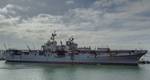 Fire damage is visible aboard amphibious assault s
