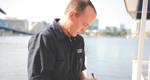File Image: A USCG safety inspector at work on the