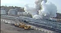 This screen shot from video captured by a camera at the nearby Illinois and Michigan Oil Company facility, shows the November 4, 2019, explosion of barge IB1940 at the Illinois Marine Towing Heritage Slip near Lemont, Ill. (Image courtesy of Illinois and Michigan Oil Company / NTSB)