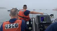 Coast Guard Station Point Allerton crew members respond during the grounding of the ferry Lightening in Boston Harbor, Friday, Aug. 16, 2019. (U.S. Coast Guard photo by Station Point Allerton)