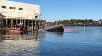 A U.S. Coast Guard boatcrew rescued four people from Darean Rose, a 40-foot commercial fishing vessel that sank in Coos Bay, Ore. (U.S. Coast Guard photo courtesy of Sector North Bend)