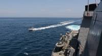Iranian Islamic Revolutionary Guard Corps Navy (IRGCN) vessels approach U.S. Military ships in international waters of the North Arabian Gulf. (U.S. Navy photo)