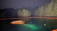 The submerged 52-foot fishing vessel, Haida Lady, surrounded by boom, February 26, 2021. Coast Guard Sector Juneau personnel received a report that the vessel sank. - U.S. Coast Guard photo by MSD Sitka personnel (Photo: Alexandria Preston / U.S. Coast Guard)