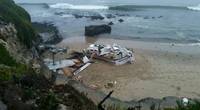 The 56-foot commercial fishing vessel, Pacific Quest, is broken and beached near Seymour Marine Discovery Center in Santa Cruz, Calif., August 13. Responders are working to remove fuel from tanks on the beach during low tide. (U.S. Coast Guard courtesy photo)