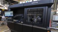 Naval Postgraduate School (NPS) recently installed Xerox’s ElemX 3D Liquid Metal Printer in the Large Experiment Annex at the Naval Postgraduate School (NPS). NPS is the first site to receive installation of this new technology. (U.S. Navy photo by Mass Communication Specialist 3rd Class Lenny Weston/RELEASED)