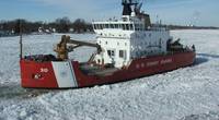 The Coast Guard Cutter Mackinaw, a 240-foot heavy icebreaker, breaks ice near Marine City, Mich., along the St. Clair River (Photo: Daniel R. Michelson / U.S. Coast Guard)