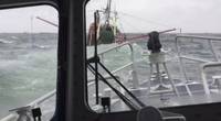 Crewmembers from Coast Guard Station New London aboard a 45-foot Response Boat-Medium approach a 55-foot fishing vessel taking on water near Fishers Island, New York, Sunday March 10, 2019. The individuals were picked up within one minute of abandoning ship. (Photo by Petty Officer 3rd Class Steven Strohmaier, courtesy of Station New London)