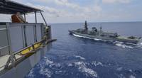 Civilian Mariner Kevin Sauls, Ship's master aboard the Henry J. Kaiser-class fleet replenishment oiler USNS Guadalupe (T-AO 200), observes the Royal Navy Duke-class frigate HMS Montrose (F 236) during a replenishment-at-sea drill. Guadalupe is conducting operations, providing logistical support to U.S. Navy and allied forces operating in the U.S. 7th Fleet area of responsibility. (U.S. Navy photo by Mass Communication Specialist 2nd Class Tristin Barth)
