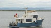 This stern-quarter view shows the very utilitarian covered after deck with room for crab traps and other cargo. Photo: Haig-Brown/Cummins