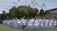 File photo: The cadets of the class of 2019 throws their covers into the air as they officially become ensigns during the 138th commencement exercises at the U.S. Coast Guard Academy in New London, Conn., May 22, 2019. (U.S. Coast Guard photo by Matthew Thieme)
