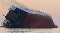 The 656-foot vehicle carrier MV Golden Ray overturned and caught fire in St. Simons Sound on September 8. (Photo: U.S. Coast Guard)