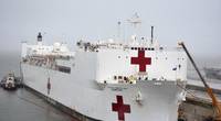 USNS Comfort (T-AH 20) takes on fuel and supplies at Naval Station Norfolk, Va. in preparation to deploy to New York in support of the nation’s COVID-19 response efforts and will serve as a referral hospital for non-COVID-19 patients currently admitted to shore-based hospitals. (U.S. Navy photo by Jim Kohler)