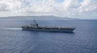 The aircraft carrier USS Theodore Roosevelt (CVN 71) returns to operations in the Philippine Sea on May 21 following an extended visit to Guam in the midst of the COVID-19 global pandemic. (U.S. Navy photo by Kaylianna Genier)