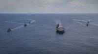 The Nimitz Carrier Strike Group, consisting of flagship USS Nimitz (CVN 68), Ticonderoga-class guided missile cruiser USS Princeton (CG 59), and Arleigh Burke-class guided missile destroyers USS Sterett (DDG 104), and USS Ralph Johnson (DDG 114), along with Indian Navy ships Rana, Sahyardi, Shivalik and Kamorta, steam in formation during a cooperative deployment in the Indian Ocean July 20. (U.S. Navy photo by Jose Madrigal)