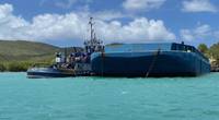 The tug boat Don Jaime and the deck barge Marilin H at the Ensenada Honda docking pier in Culebra, Puerto Rico on April 21, 2021. (Photo: U.S. Coast Guard)