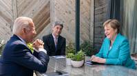File photo: President Joe Biden meets for a brief pull-aside meeting with German Chancellor Angela Merkel during the G7 Summit at the Carbis Bay Hotel and Estate on Saturday, June 12, 2021, in St. Ives, Cornwall, England. (Official White House Photo by Adam Schultz)