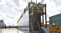 Eddie Barnes, Jr., namesake for new dry-dock at Bollinger Quick Repair, Harvey, La. stands in front of the “Mr. Eddie”. (Photo: Bollinger Shipyards)