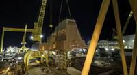 Two cranes were used to lift the 320-ton aft deckhouse onto guided missile destroyer Jack H. Lucas (DDG 125) at Ingalls Shipbuilding in Pascagoula, Miss. (Photo: HII)