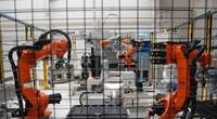 A robot’s battle against emissions: Siemens articulated robots of different sizes assemble battery stacks at Trondheim, Norway.
Credit: William Stoichevski