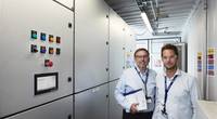 Jens Hjorteset (right) is the Technical Product Manager for SAVe Energy. Erling Johannesen (left) is the Site Manager at Rolls-Royce Power Electric Systems department in Bergen, Norway. (Photo: Øystein Klakegg/Rolls-Royce Marine)