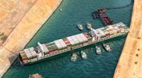 Illustration of the Ever Given blocking the Suez Canal - Credit: Corona Borealis/AdobeStock
