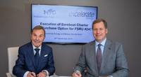 From left to right, MGM owner John Angelicoussis and Excelerate Managing Director and President Steven Kobos sign the agreement. Photo: Excelerate Energy