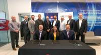 Front row L to R: Bart Reynolds, President Seaspan Marine, Crystal Smith, Chief Councillor Haisla Nation, Frank Butzelaar, CEO Seaspan Marine Transportation – Back row: Representatives from Seaspan, the Haisla Nation and union leadership witnessed the signing of the agreement.