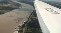 Flying into New Orleans with Admiral Karl Schultz, Commandant, USCG, provides a ‘birds eye view’ on the robust and diverse business in and around the lower Mississippi River. Photo: Greg Trauthwein