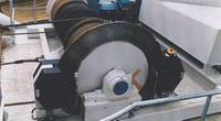 A luffing and trolley travel hoist for bagged material used by two vessel loaders at Lake Charles, Louisiana. The hoists are fitted with Dellner SKP service brakes with mounting stands installed between the hoist motors and the reduction gears. The brakes were also manufactured with extra protection to prevent corrosion from sea water.