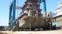 A steel tug built by Horizon Shipbuilding on the 660-ton Travelift at Metal Shark’s newly-acquired Alabama Shipyard (Photo: Metal Shark)