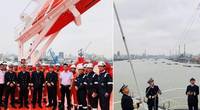 The crew gathers for the flag hoisting. Photos: Odfjell