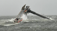 A U.S. Coast Guard Response Boat-Medium boat crew heads toward the capsized lift boat Seacor Power about 8 miles off Port Fourchon, La. on April 13, 2021. (U.S. Coast Guard photo courtesy of Coast Guard Cutter Glenn Harris)
